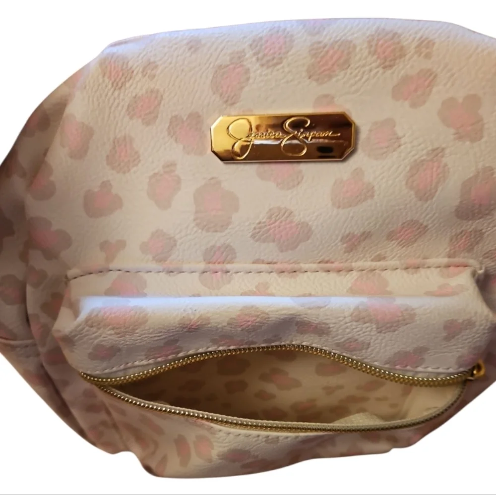 Jessica Simpson Cream, Pink, and Tan Animal Print Backpack, Compact